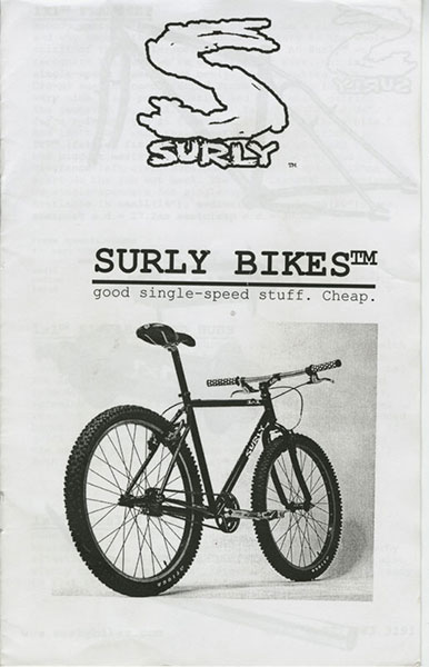 Surly Bikes 1999 catalog cover - black text, with rear, right side image of a bike - black & white