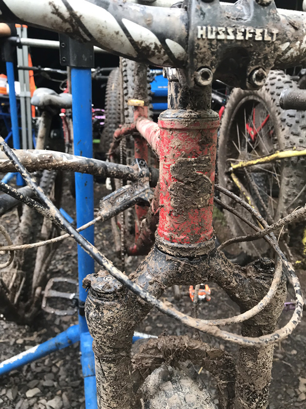 Front view of bike with a muddy headset and fork