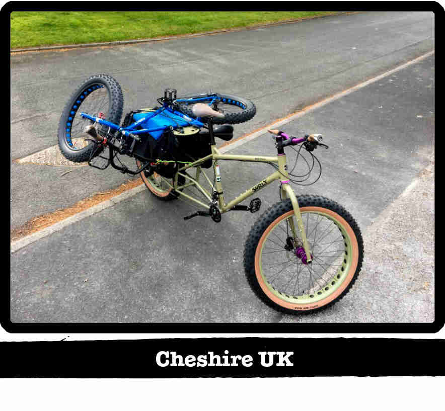 Right side view of a Surly Big Fat Dummy bike with a fat bike on the rear rack - Cheshire, UK tag below image