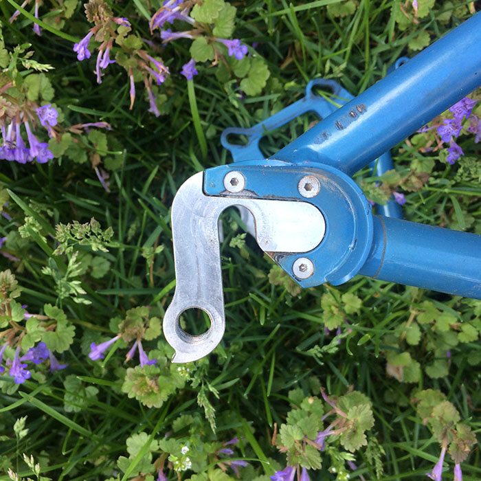 Close up of the dropouts on a Surly Krampus prototype bike frame, blue