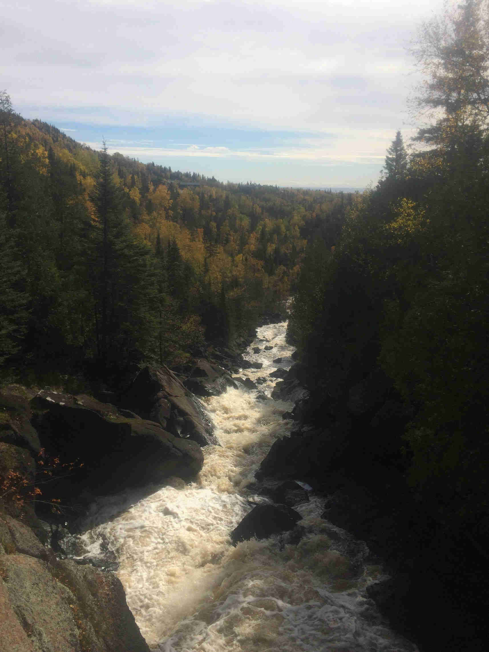 A raging river flowing down a gorge in the Superior National Forest