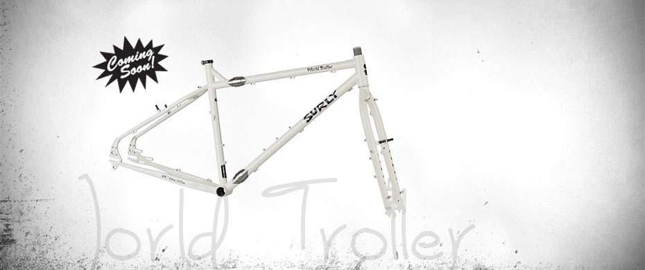 Surly World Troll bike frame - white - right side view - faded white background with a Coming Soon ad burst